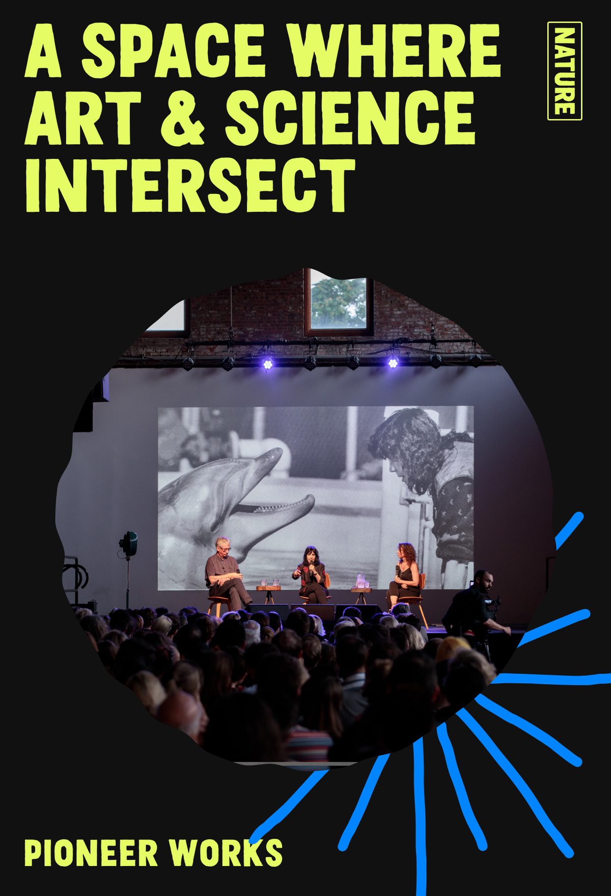 Pioneer Works: A space where art and science intersect. Inset photo of large event space with speakers on the stage and a projection of a dolphin poking its head out of the water towards a trainer in the background.